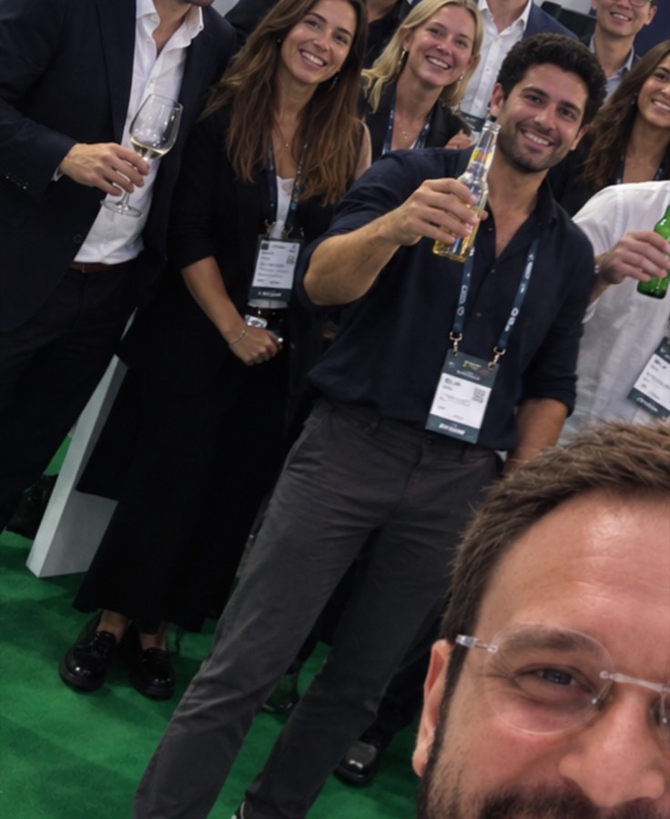 The team on the expo floor between sessions